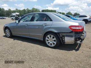 2013 Mercedes-Benz E 350 Luxury with VIN WDDHF8JBXDA721657, listed as a Copart auction lot 63260475 with 49,357 mi miles and Salvage title. Bid and sale history available at DreamBid. Image 2.