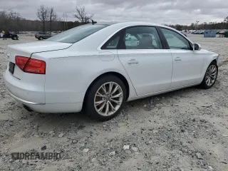 2014 Audi A8 3.0T z VIN WAURGAFD3EN003758, wystawiony jako Copart lot #47636885 z przebiegiem 166 990 mil mil oraz Szkody całkowita. Historia ofert i sprzedaży dostępna na DreamBid. Obrazek 3.
