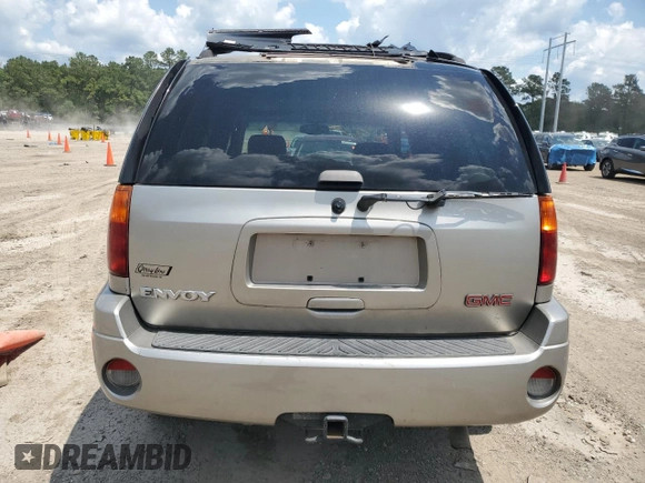 2002 GMC Envoy SLT z VIN 1GKDS13S922263923, wystawiony jako Copart lot #59234395 z przebiegiem Nie podano mil oraz Szkoda całkowita • Salvage title. Historia ofert i sprzedaży dostępna na DreamBid. Obrazek 6.