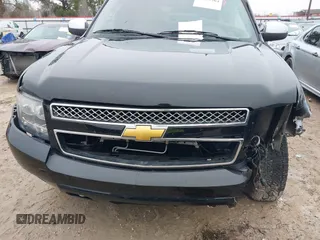 2014 Chevrolet Tahoe LT z VIN 1GNSCBE04ER143872, wystawiony jako IAAI lot #41377204 z przebiegiem 119 533 mil mil oraz . Historia ofert i sprzedaży dostępna na DreamBid. Obrazek 12.