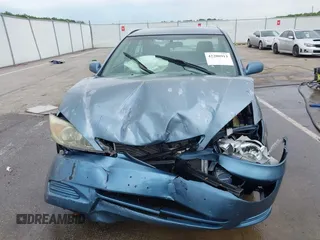 2002 Toyota Camry LE z VIN 4T1BE32KX2U617732, wystawiony jako IAAI lot #42208913 z przebiegiem Nie podano mil oraz . Historia ofert i sprzedaży dostępna na DreamBid. Obrazek 12.