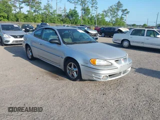 2003 Pontiac Grand Am GT z VIN 1G2NW12E33C173053, wystawiony jako IAAI lot #42146372 z przebiegiem 149 205 mil mil oraz . Historia ofert i sprzedaży dostępna na DreamBid. Obrazek 1.