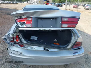 1999 Buick Park Avenue с VIN 1G4CW52K5X4607713, выставлен на аукционе IAAI как лот 42387667 с пробегом 106 786 миль миль и . История ставок и продаж доступна на DreamBid. Изображение 6.