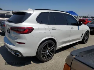 2019 BMW X5 xDrive40i with VIN 5UXCR6C57KLK85504, listed as a Copart auction lot 60908665 with 21,333 mi miles and Salvage title. Bid and sale history available at DreamBid. Image 3.