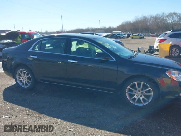 2011 Chevrolet Malibu LTZ with VIN 1G1ZE5E18BF143021, listed as a IAAI auction lot 41802508 with 148,866 mi miles and . Bid and sale history available at DreamBid. Image 13.