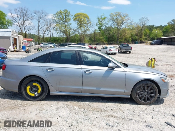 2016 Audi A6 Premium z VIN WAUCFAFC2GN111968, wystawiony jako IAAI lot #42003738 z przebiegiem 149 089 mil mil oraz . Historia ofert i sprzedaży dostępna na DreamBid. Obrazek 13.