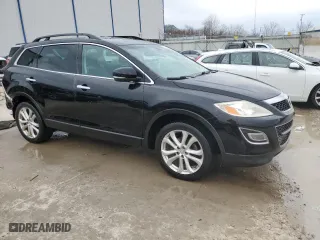 2011 Mazda CX-9 Grand Touring with VIN JM3TB2DA3B0305086, listed as a Copart auction lot 47216945 with 199,733 mi miles and Non Repairable. Bid and sale history available at carsss.com. Image 4.