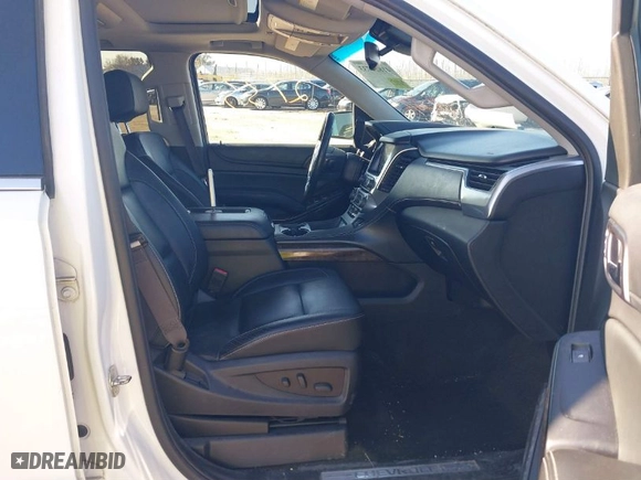 2016 Chevrolet Suburban LT with VIN 1GNSKHKC5GR242109, listed as a IAAI auction lot 41822733 with 138,032 mi miles. Bid and sale history available at carsss.com. Image 5.