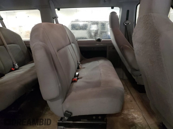 2014 Ford Econoline Passenger XL z VIN 1FBSS3BL1EDA50437, wystawiony jako Copart lot #48759795 z przebiegiem 538 501 mil mil oraz Nie do naprawy. Historia ofert i sprzedaży dostępna na DreamBid. Obrazek 11.
