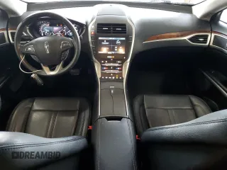 2015 Lincoln MKZ z VIN 3LN6L2GK4FR613117, wystawiony jako Copart lot #54141735 z przebiegiem 129 072 mil mil oraz Szkoda całkowita • Salvage title. Historia ofert i sprzedaży dostępna na DreamBid. Obrazek 8.