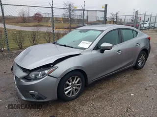 2016 Mazda 3 i Grand Touring z VIN 3MZBM1X74GM245295, wystawiony jako IAAI lot #41079843 z przebiegiem 183 480 mil mil oraz . Historia ofert i sprzedaży dostępna na DreamBid. Obrazek 2.