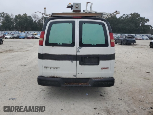 2003 GMC Savana Cargo z VIN 1GTHG35U831199213, wystawiony jako Copart lot #86549414 z przebiegiem Nie podano mil oraz Szkody całkowita. Historia ofert i sprzedaży dostępna na DreamBid. Obrazek 6.