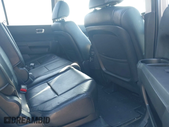 2012 Honda Pilot EX-L with VIN 5FNYF4H52CB029322, listed as a IAAI auction lot 41886279 with 156,436 mi miles and . Bid and sale history available at DreamBid. Image 8.