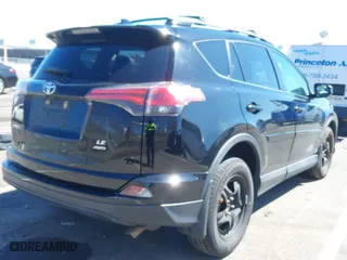 2018 Toyota RAV4 LE with VIN 2T3BFREV1JW827888, listed as a IAAI auction lot 41901303 with 181,279 mi miles. Bid and sale history available at carsss.com. Image 4.