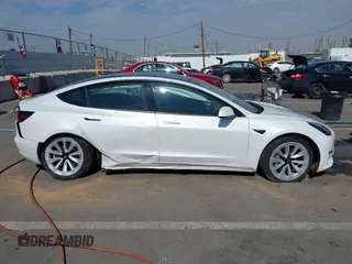 2023 Tesla Model 3 with VIN 5YJ3E1EA9PF640015, listed as a IAAI auction lot 41622086 with 15,622 mi miles and . Bid and sale history available at carsss.com. Image 13.
