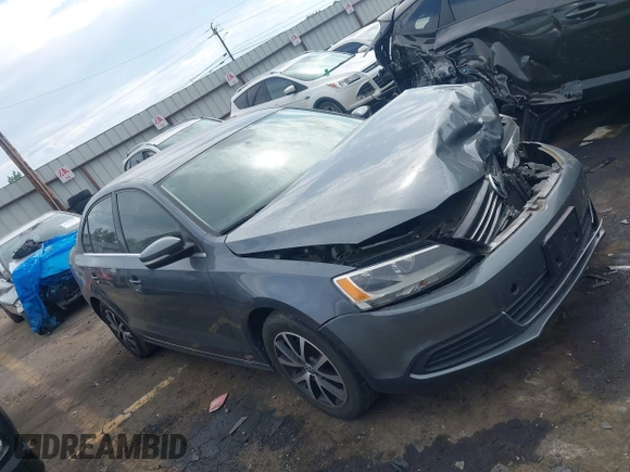 2014 Volkswagen Jetta SE z VIN 3VWD17AJ9EM298175, wystawiony jako IAAI lot #42084756 z przebiegiem 93 039 mil mil oraz . Historia ofert i sprzedaży dostępna na DreamBid. Obrazek 12.