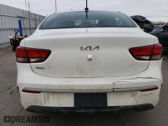 2023 Kia Rio LX with VIN 3KPA24AD0PE566085, listed as a Copart auction lot 50354455 with 65,203 mi miles and Salvage Title. Bid and sale history available at DreamBid. Image 6.