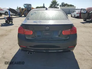 2014 BMW 3 Series 328i with VIN WBA3C1C5XEK106904, listed as a Copart auction lot 60565595 with 91,576 mi miles and Salvage title. Bid and sale history available at DreamBid. Image 6.