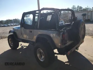 1994 Jeep Wrangler with VIN 1J4FY29S4RP471828, listed as a Copart auction lot 87893385 with 210,743 mi miles and Salvage Title. Bid and sale history available at carsss.com. Image 2.