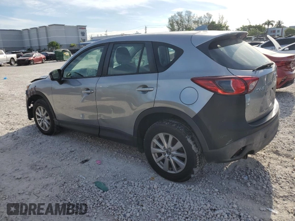 2015 Mazda CX-5 Sport with VIN JM3KE2BE2F0445810, listed as a Copart auction lot 65672555 with 218,675 mi miles and Clean title. Bid and sale history available at DreamBid. Image 2.