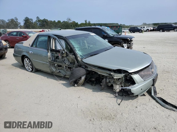 2007 Cadillac DTS Performance z VIN 1G6KD57967U131549, wystawiony jako Copart lot #70918804 z przebiegiem 73 618 mil mil oraz Szkoda całkowita • Salvage title. Historia ofert i sprzedaży dostępna na DreamBid. Obrazek 4.