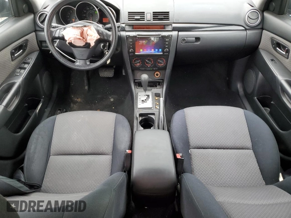 2006 Mazda 3 i Touring with VIN JM1BK32G761490132, listed as a Copart auction lot 52937645 with 146,299 mi miles and Salvage Title. Bid and sale history available at DreamBid. Image 8.