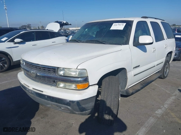 2003 Chevrolet Tahoe LT with VIN 1GNEC13Z73R168819, listed as a IAAI auction lot 41679179 with 141,164 mi miles. Bid and sale history available at carsss.com. Image 2.