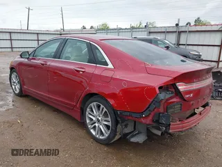 2014 Lincoln MKZ Hybrid z VIN 3LN6L2LU7ER811633, wystawiony jako IAAI lot #41870485 z przebiegiem 203 692 mil mil oraz . Historia ofert i sprzedaży dostępna na DreamBid. Obrazek 3.