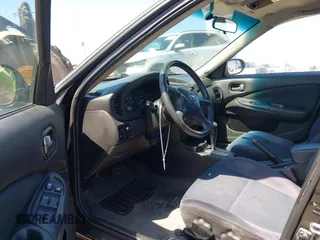 2005 Nissan Sentra 1.8 with VIN 3N1CB51D75L470495, listed as a IAAI auction lot 42194198 with 212,368 mi miles and . Bid and sale history available at DreamBid. Image 5.