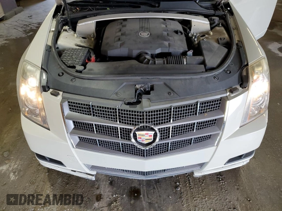 2011 Cadillac CTS Luxury z VIN 1G6DG5EY6B0127401, wystawiony jako Copart lot #57079285 z przebiegiem 125 882 mil mil oraz Szkoda całkowita • Salvage title. Historia ofert i sprzedaży dostępna na DreamBid. Obrazek 11.