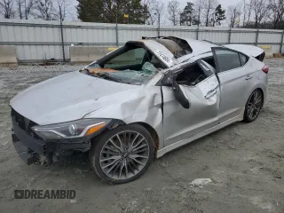 2018 Hyundai Elantra Sport с VIN KMHD04LBXJU505989, выставлен на аукционе Copart как лот 77474684 с пробегом Не указан миль и На запчасти • Non repairable. История ставок и продаж доступна на DreamBid. Изображение 1.