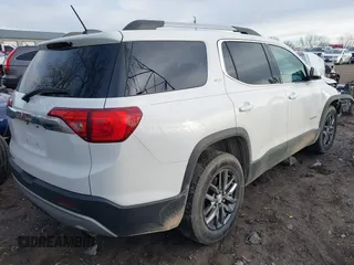 2018 GMC Acadia SLT with VIN 1GKKNMLA9JZ108429, listed as a IAAI auction lot 41211723 with 128,456 mi miles and . Bid and sale history available at DreamBid. Image 4.