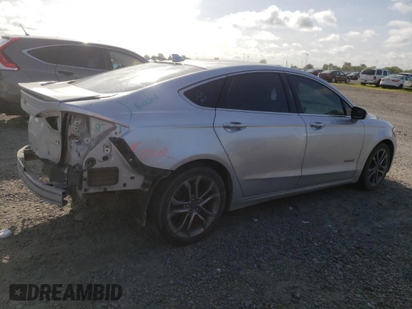 2019 Ford Fusion Titanium z VIN 3FA6P0RU5KR217242, wystawiony jako Copart lot #51985955 z przebiegiem 95 220 mil mil oraz Szkoda całkowita • Salvage title. Historia ofert i sprzedaży dostępna na DreamBid. Obrazek 3.