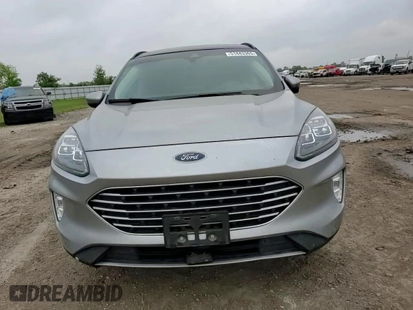 2021 Ford Escape Titanium с VIN 1FMCU9J99MUB12020, выставлен на аукционе Copart как лот 51443365 с пробегом 63 504 миль миль и Списание • Salvage title. История ставок и продаж доступна на DreamBid. Изображение 10.