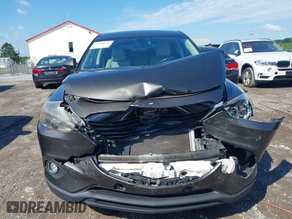 2015 Mazda CX-9 Grand Touring z VIN JM3TB3DV8F0465155, wystawiony jako IAAI lot #42366636 z przebiegiem 125 407 mil mil oraz . Historia ofert i sprzedaży dostępna na DreamBid. Obrazek 12.