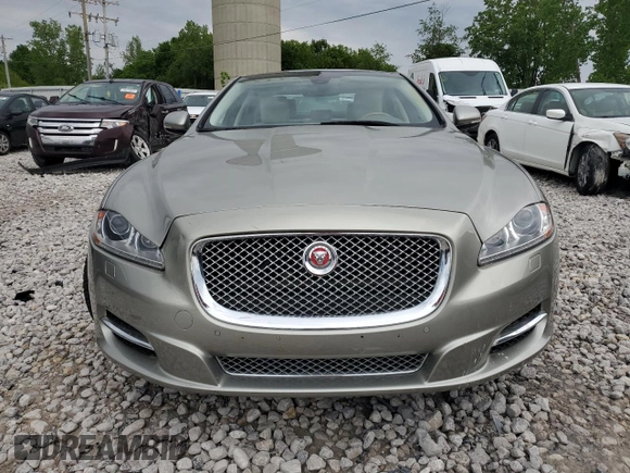 2014 Jaguar XJ z VIN SAJWJ1CD9E8V62338, wystawiony jako Copart lot #58924065 z przebiegiem 60 909 mil mil oraz Czysty tytuł • Clean title. Historia ofert i sprzedaży dostępna na DreamBid. Obrazek 5.