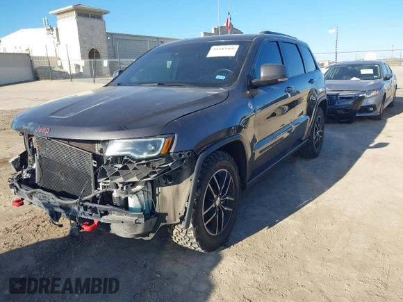 2018 Jeep Grand Cherokee Trailhawk with VIN 1C4RJFLT9JC244212, listed as a IAAI auction lot 41443469 with 77,953 mi miles and . Bid and sale history available at DreamBid. Image 18.