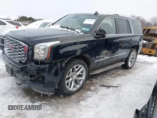 2020 GMC Yukon Denali with VIN 1GKS2CKJ5LR301216, listed as a IAAI auction lot 41439076 with 76,129 mi miles. Bid and sale history available at carsss.com. Image 17.