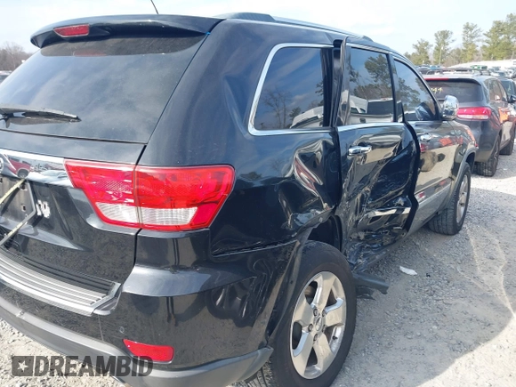 2013 Jeep Grand Cherokee Limited with VIN 1C4RJEBGXDC520609, listed as a IAAI auction lot 41493503 with 173,020 mi miles. Bid and sale history available at carsss.com. Image 6.