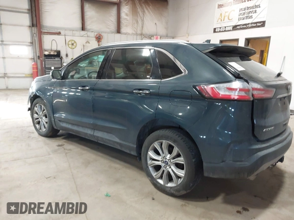 2019 Ford Edge Titanium with VIN 2FMPK4K93KBB01364, listed as a IAAI auction lot 41286263 with 134,588 mi miles. Bid and sale history available at carsss.com. Image 3.
