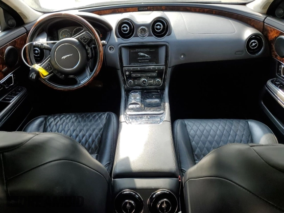 2016 Jaguar XJ Portfolio with VIN SAJWJ2GD8G8V92997, listed as a Copart auction lot 72420774 with 74,934 mi miles and Salvage title. Bid and sale history available at DreamBid. Image 8.