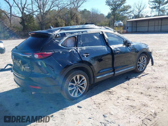 2018 Mazda CX-9 Grand Touring z VIN JM3TCADY5J0204845, wystawiony jako IAAI lot #41292695 z przebiegiem 98 751 mil mil oraz . Historia ofert i sprzedaży dostępna na DreamBid. Obrazek 4.