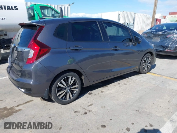 2019 Honda Fit EX-L z VIN 3HGGK5H01KM721343, wystawiony jako IAAI lot #41945425 z przebiegiem 23 312 mil mil oraz . Historia ofert i sprzedaży dostępna na DreamBid. Obrazek 4.