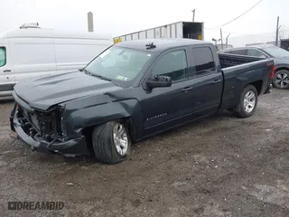 2018 Chevrolet Silverado 1500 LT with VIN 1GCVKREC9JZ200573, listed as a IAAI auction lot 41656239 with 74,000 mi miles. Bid and sale history available at carsss.com. Image 2.