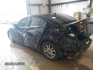 2015 Mazda 3 i Touring z VIN 3MZBM1V70FM163050, wystawiony jako IAAI lot #42236590 z przebiegiem 123 233 mil mil oraz . Historia ofert i sprzedaży dostępna na DreamBid. Obrazek 6.