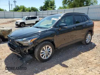 2023 Toyota Corolla Cross LE with VIN 7MUCAAAG3PV058094, listed as a Copart auction lot 57983105 with 30,593 mi miles and Salvage title. Bid and sale history available at DreamBid. Image 1.