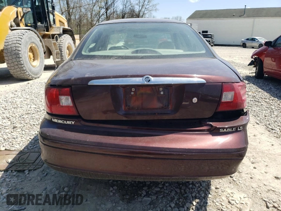 2000 Mercury Sable LS Premium z VIN 1MEFM55S9YA642372, wystawiony jako Copart lot #54555125 z przebiegiem 124 642 mil mil oraz Szkody całkowita. Historia ofert i sprzedaży dostępna na DreamBid. Obrazek 6.
