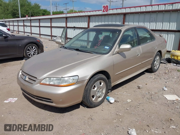 2002 Honda Accord EX z VIN 1HGCG16502A014058, wystawiony jako IAAI lot #42030847 z przebiegiem 160 708 mil mil oraz . Historia ofert i sprzedaży dostępna na DreamBid. Obrazek 2.