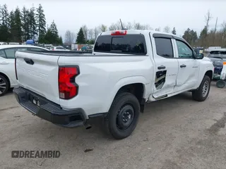 2023 Chevrolet Colorado 2WD Work Truck z VIN 1GCGSBECXP1210035, wystawiony jako IAAI lot #41906185 z przebiegiem 15 001 mil mil oraz . Historia ofert i sprzedaży dostępna na DreamBid. Obrazek 4.