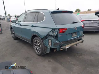 2019 Volkswagen Tiguan SE with VIN 3VV3B7AX3KM113955, listed as a IAAI auction lot 42164890 with 77,806 mi miles and . Bid and sale history available at DreamBid. Image 3.